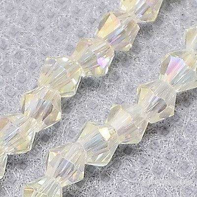 Glaspärlor Bicone – Svagt gul, 3mm, 1 sträng Glaspärlor Bicone – Svagt gul, 3mm, 1 sträng