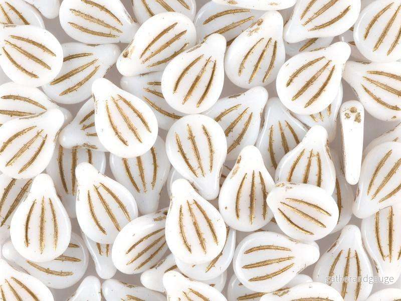Preciosa Engraved Pip – Alabaster Gold Painted 9x14mm, 5-pack Preciosa Engraved Pip – Alabaster Gold Painted 9x14mm, 5-pack