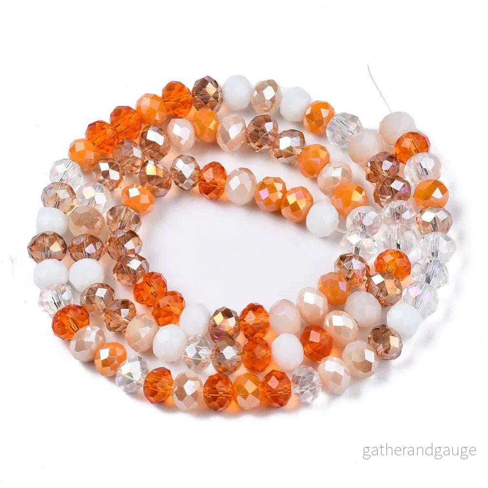 Facetterade glaspärlor – Orange Mix, 6x5mm 1 sträng Facetterade glaspärlor – Orange Mix, 6x5mm 1 sträng
