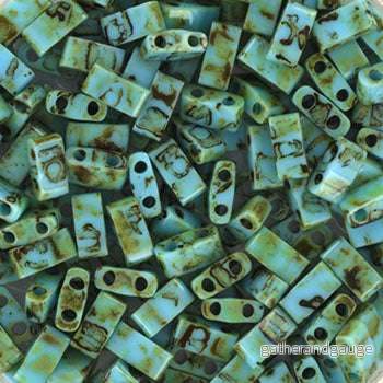 Miyuki Half Tila – Opaque Picasso Turquoise Blue 5×2,5mm, 5 gram Miyuki Half Tila – Opaque Picasso Turquoise Blue 5×2,5mm, 5 gram