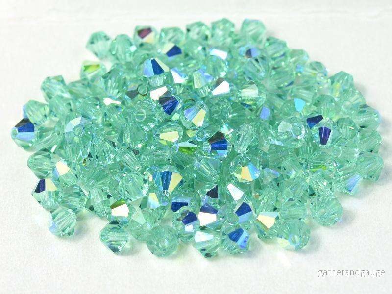 Tjeckiska MC Bicone - Caribbean Sea AB 3 mm 30-pack