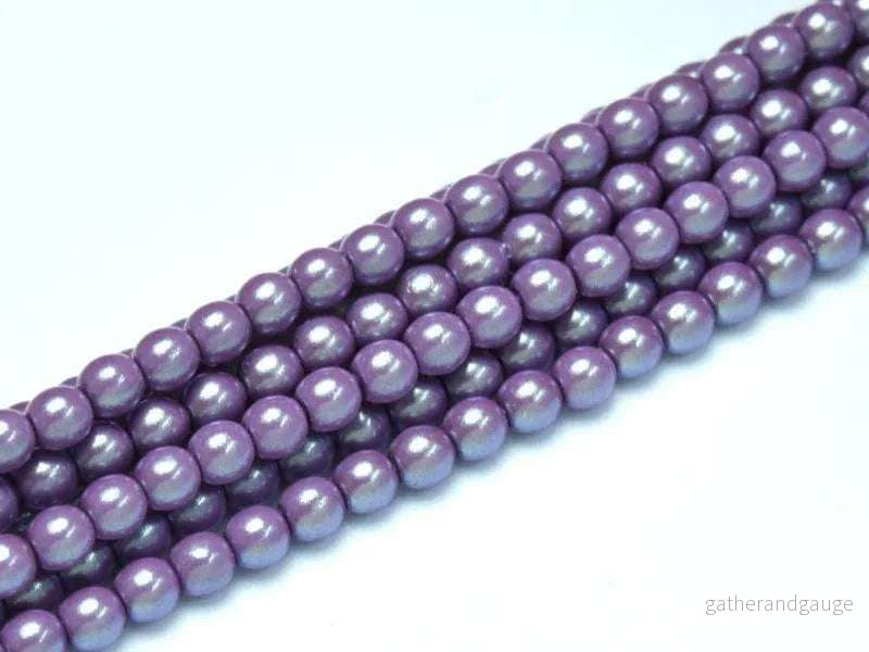 Tjeckiska Pearl Shell - Lilac 2mm, 1 sträng
