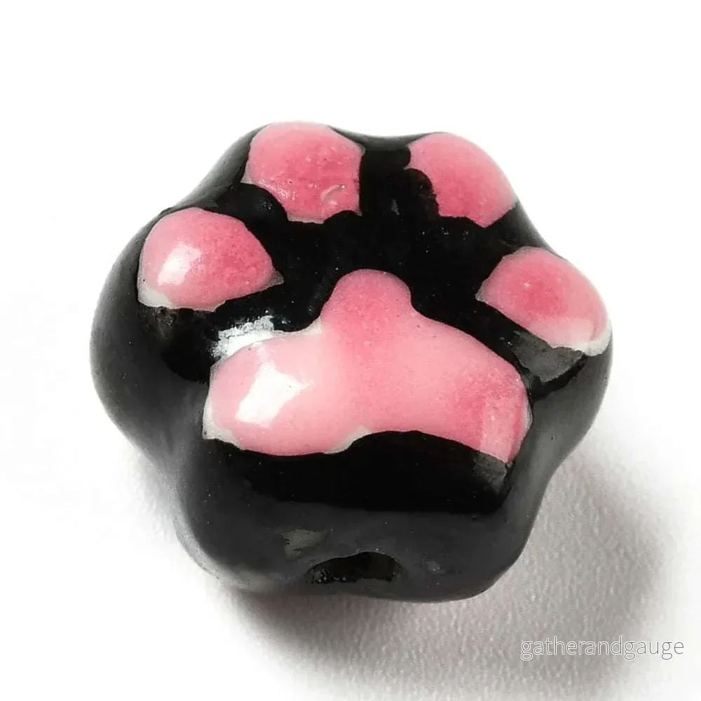 Porslinspärla - Tass svart / rosa 13x15mm 1 styck