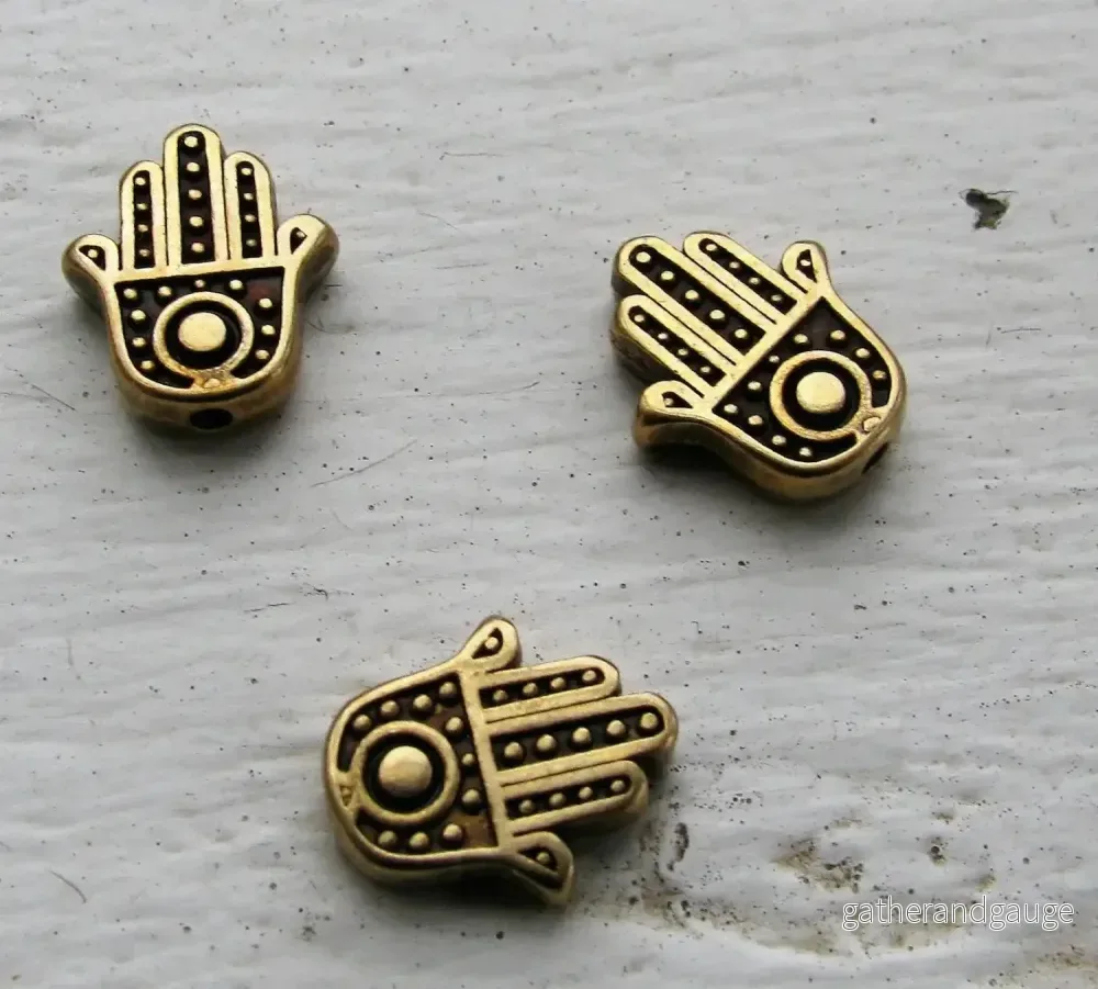 Mellandel bronsfärgad Hamsa hand 12x10mm 3-pack
