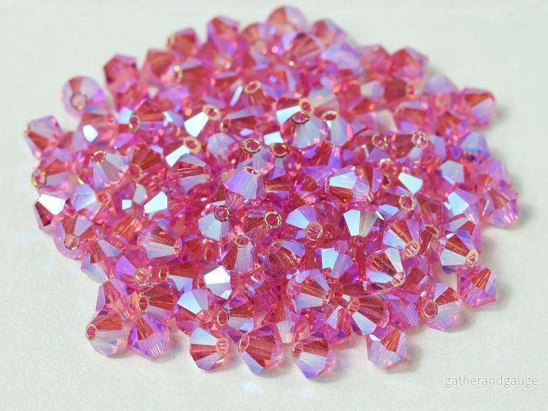 Tjeckiska Bicone - Indian Pink 2x AB, 4 mm, 30-pack - Bild 2