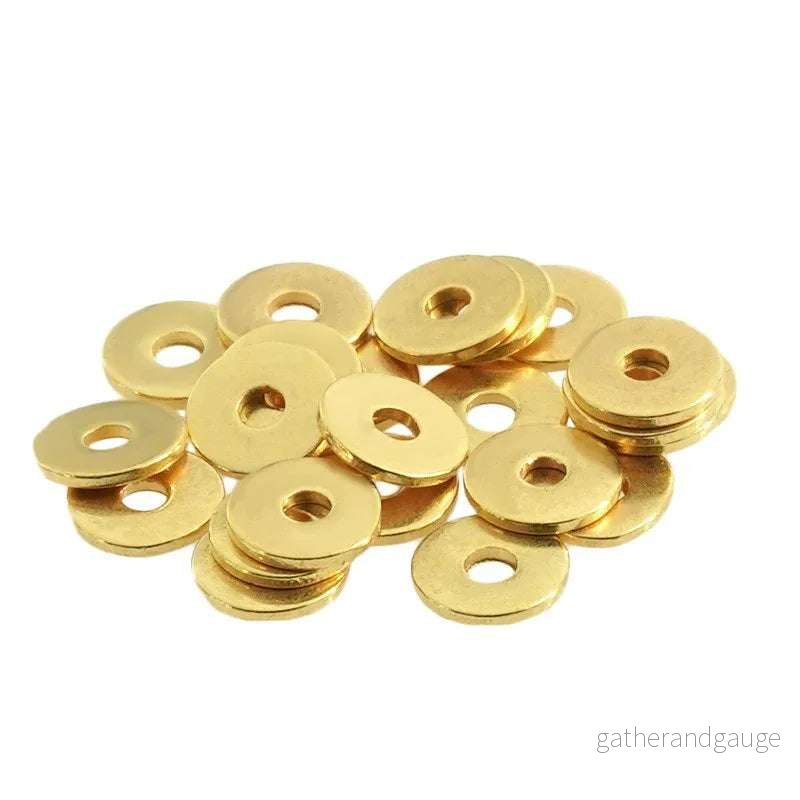 Mellandel Guldfärgad – Platt rund 0,5x4mm 10-pack Mellandel Guldfärgad – Platt rund 0,5x4mm 10-pack
