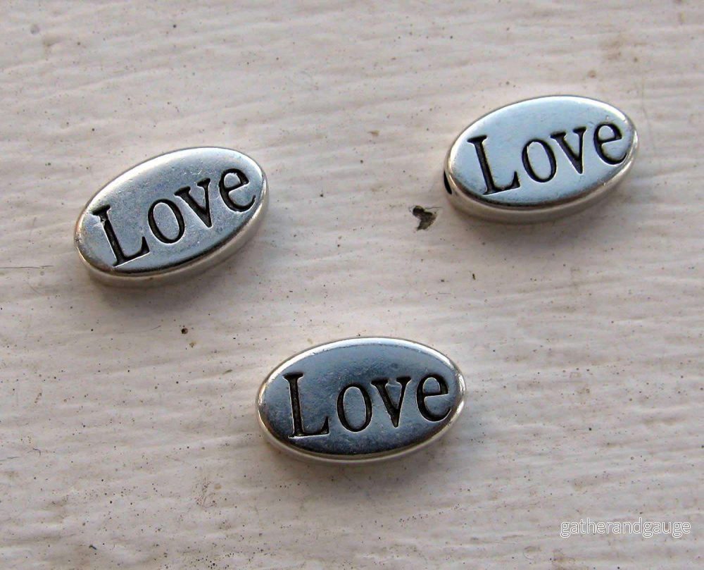 Mellandel Silverfärgad – Oval LOVE, 3-Pack Mellandel Silverfärgad – Oval LOVE, 3-Pack