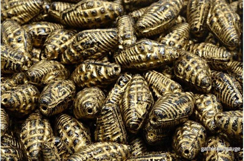 Miter Shell Beads - Jet with Gold 16x8mm, 10-pack