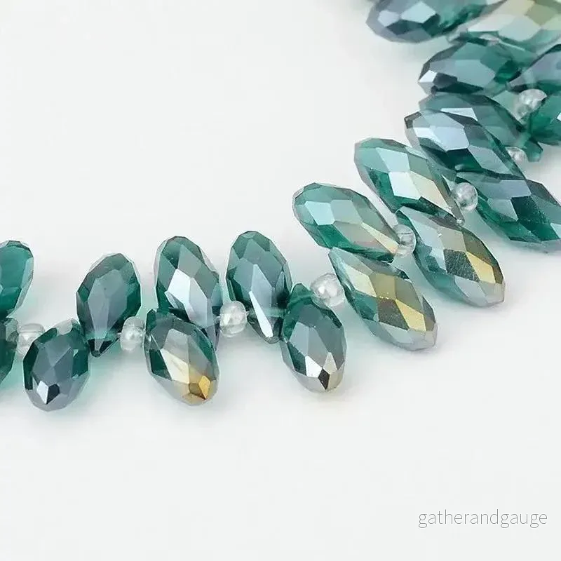Facetterade droppar - Teal skimmer, 13x6mm, 1 sträng - Bild 2