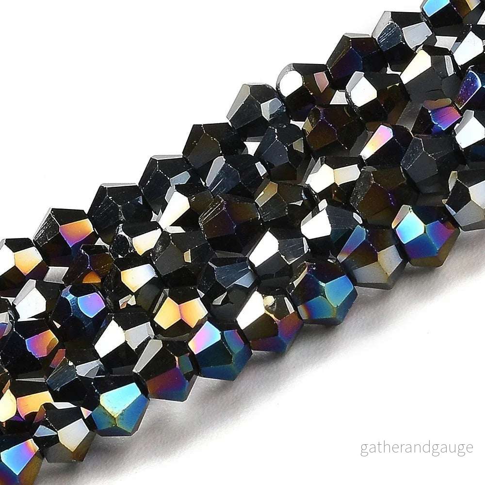 Glaspärlor Bicone – Svart AB, 3×2,5mm, 1 sträng Glaspärlor Bicone – Svart AB, 3×2,5mm, 1 sträng