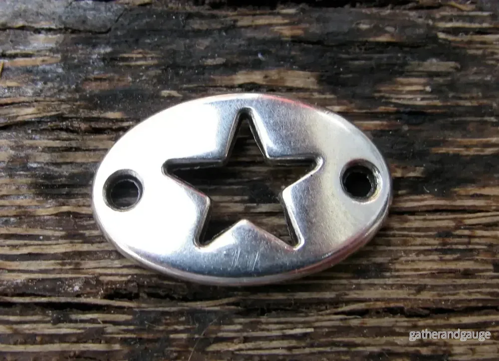 Connector Silverfärgad - Oval med stjärna 20x13mm 1 styck