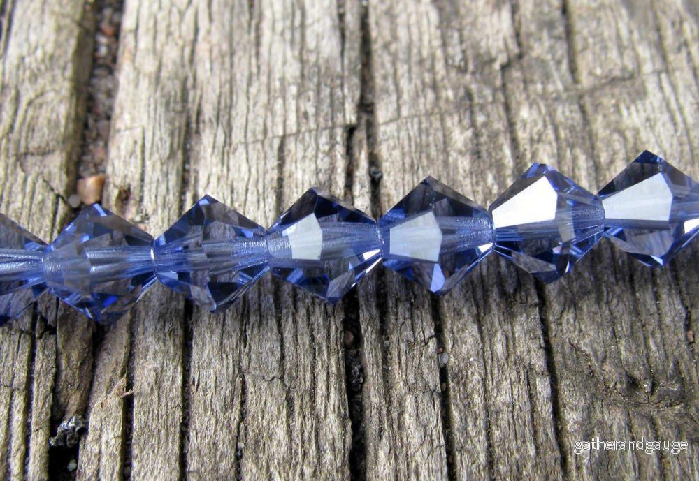 Tjeckiska MC Bicone - Tanzanite 6 mm, 1 sträng