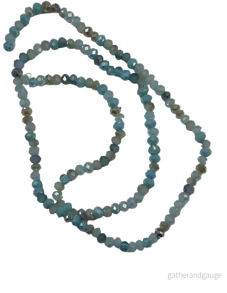 Facetterade glaspärlor – Turkos mix 3×2.5mm, 1 sträng Facetterade glaspärlor – Turkos mix 3×2.5mm, 1 sträng