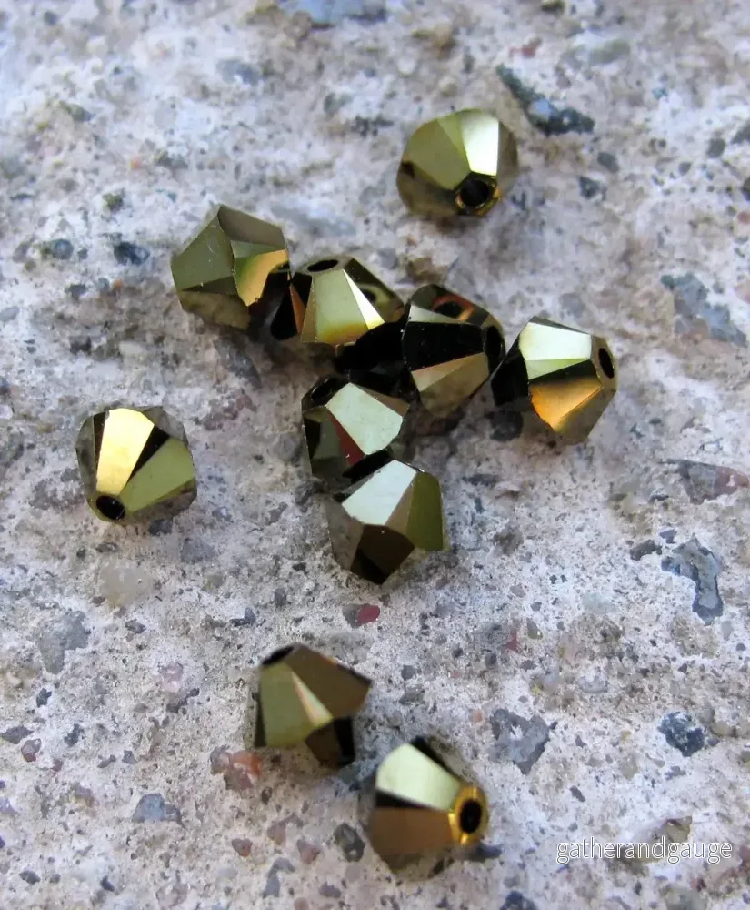 Swarovski Crystals Bicone (5328) – Crystal Dorado 2X 4mm, 10-pack Swarovski Crystals Bicone (5328) – Crystal Dorado 2X 4mm, 10-pack
