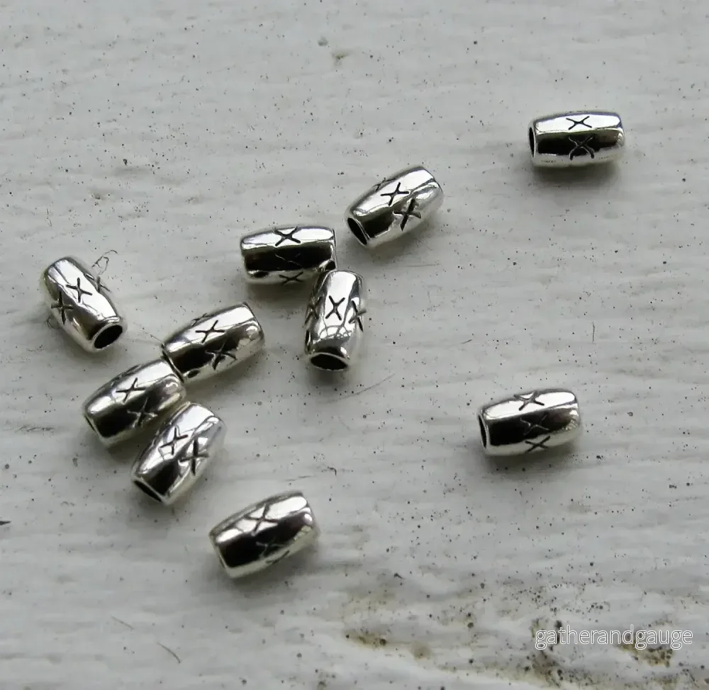 Mellandel Silverfärgad – Tub med kryss 3,4×5,4 mm, 10-pack