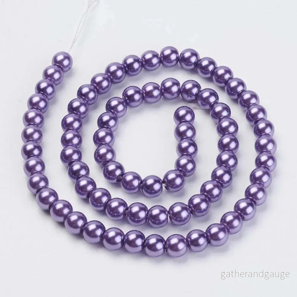 Vaxade glaspärlor - Mauve 6mm 1 sträng