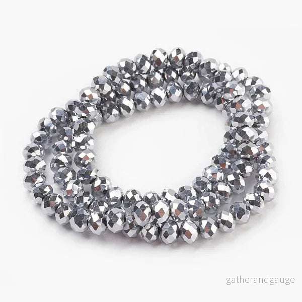 Facetterade glaspärlor – Silver 6x4mm 1 sträng Facetterade glaspärlor – Silver 6x4mm 1 sträng