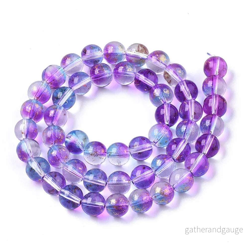 Glaspärlor Rund – Blålila Guldshimmer 8mm 1 sträng Glaspärlor Rund – Blålila Guldshimmer 8mm 1 sträng