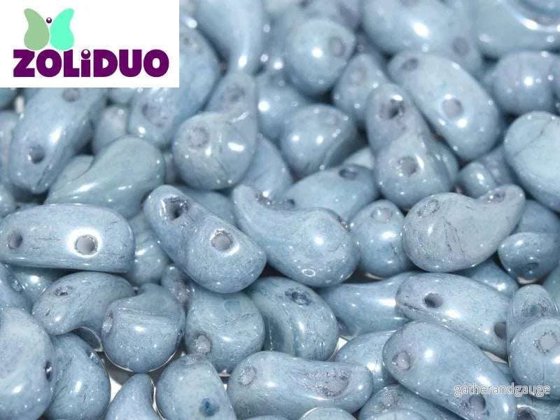 Zoliduo Vänster – Alabaster Baby Blue Luster 5x8mm, 20-pack Zoliduo Vänster – Alabaster Baby Blue Luster 5x8mm, 20-pack