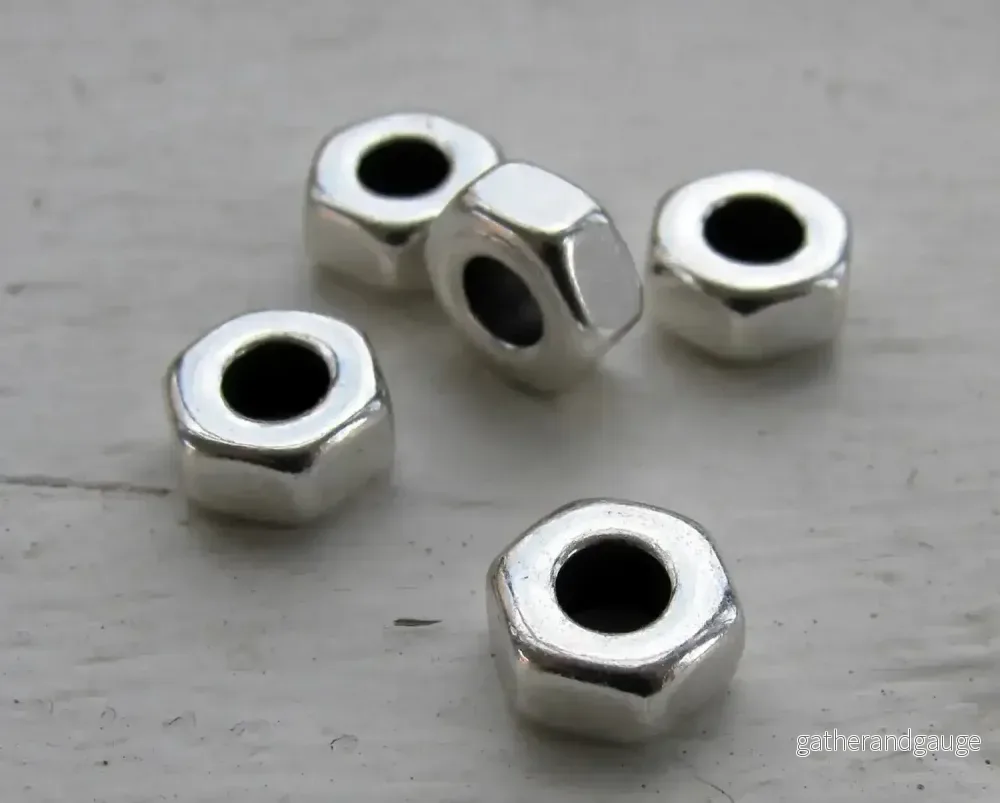 Mellandel Silverfärgad - Mutter 8x4mm 5-pack - Bild 2