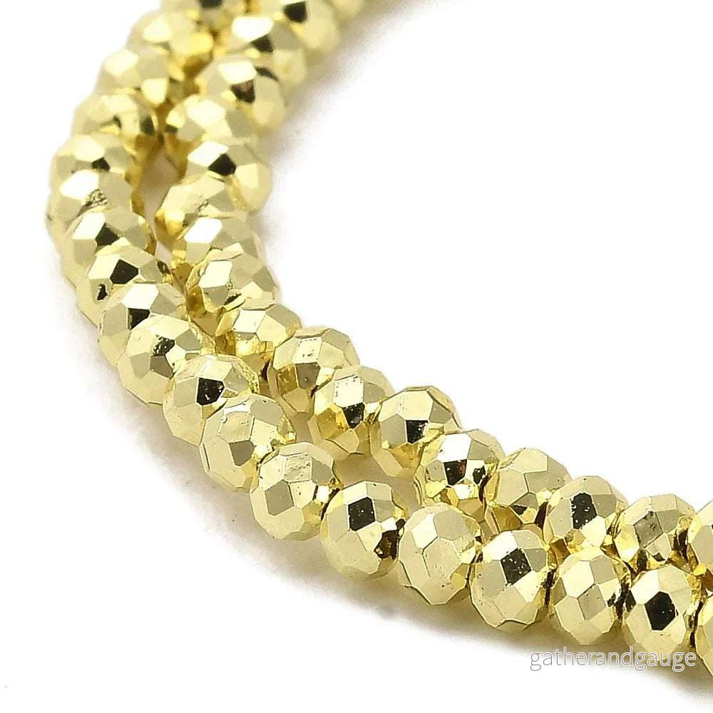 Facetterade glaspärlor - EP guldgulfärgad, 3x2.5mm, 1 sträng - Bild 2