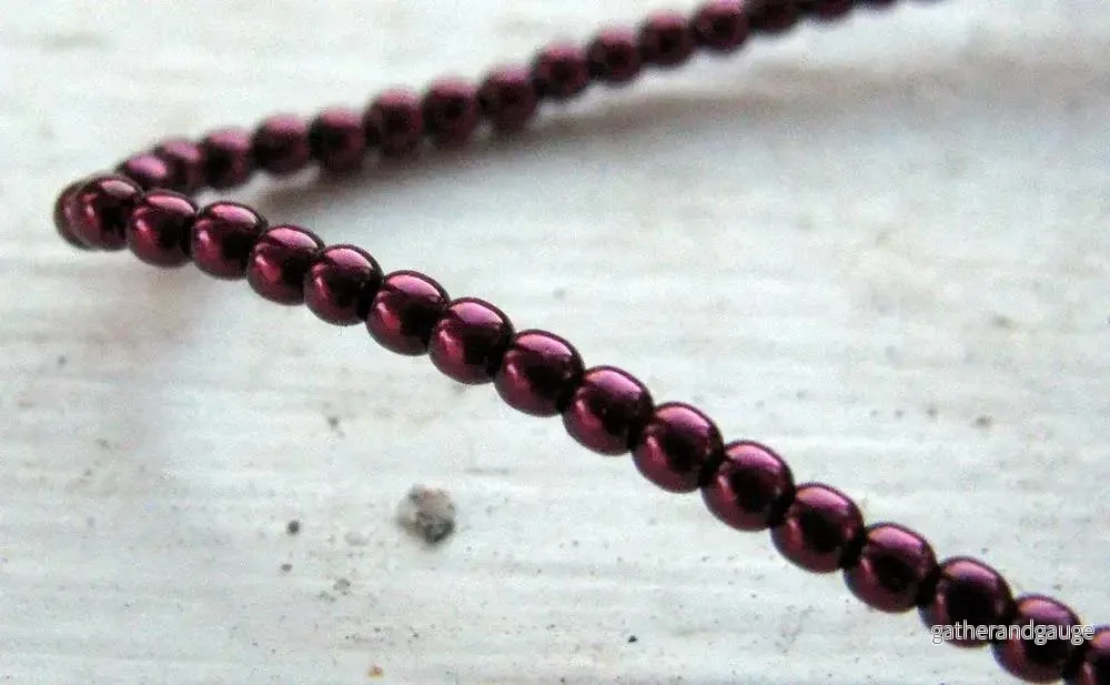 Tjeckiska vaxade glaspärlor – Burgundy 2mm, 1 sträng
