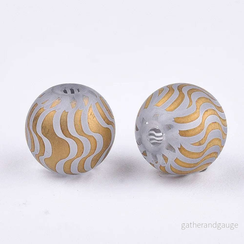 Glaspärla Rund – Randigt mönster Gold 8mm 1 styck
