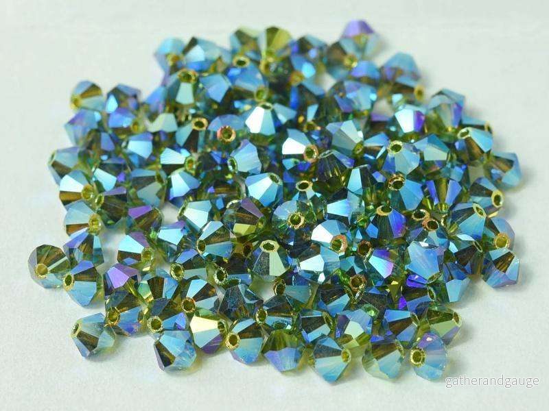 Tjeckiska Bicone - Olivine 2x AB, 4 mm, 30-pack - Bild 2