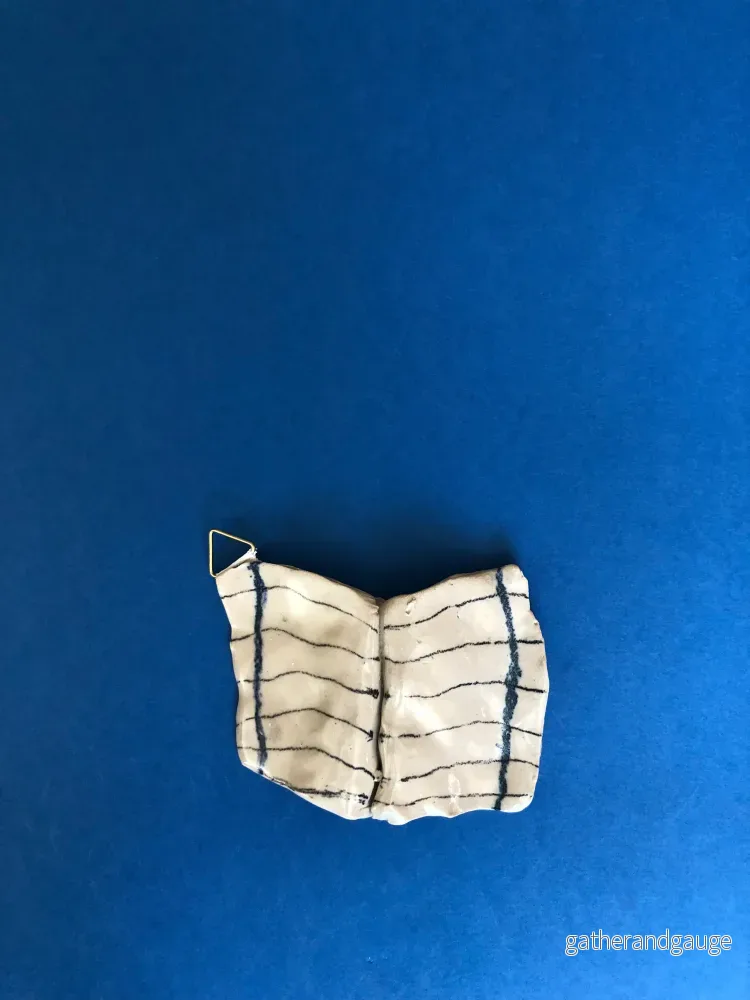 Mini-bok till tavelväggen