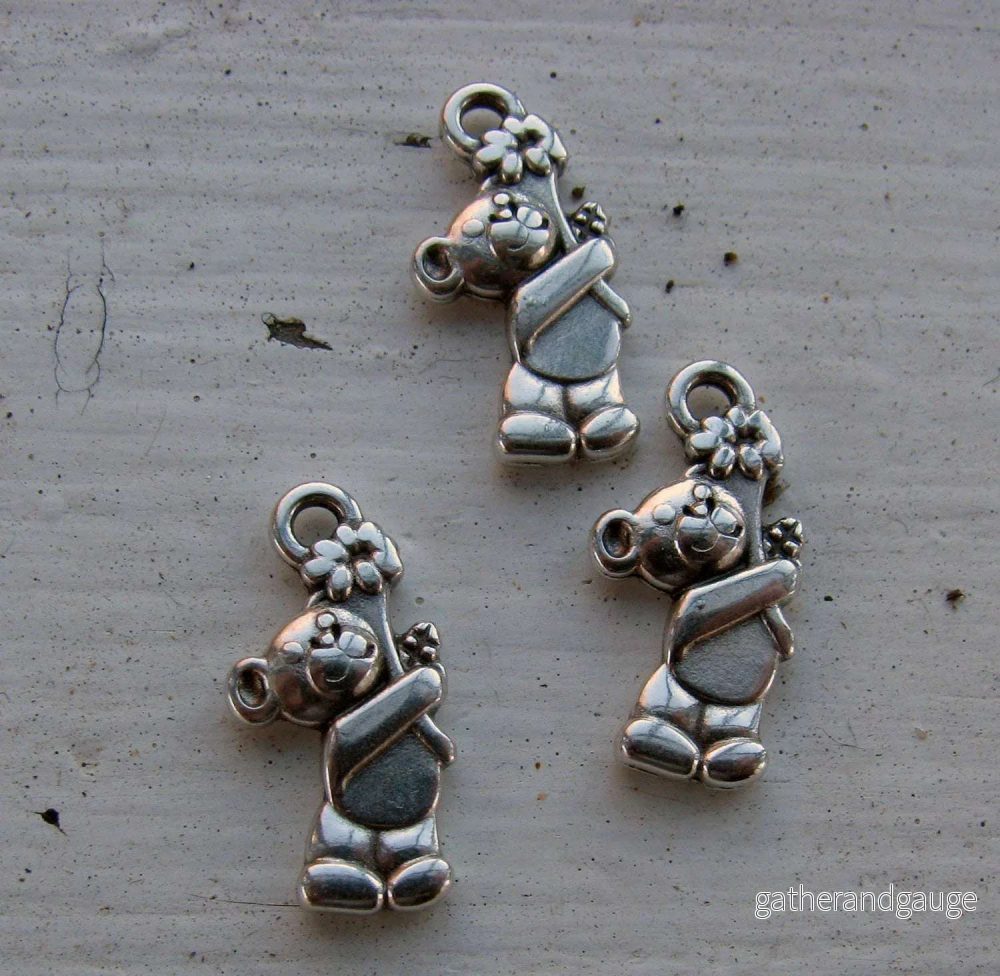 Berlock silverfärgad – Nalle med blomma 3-pack