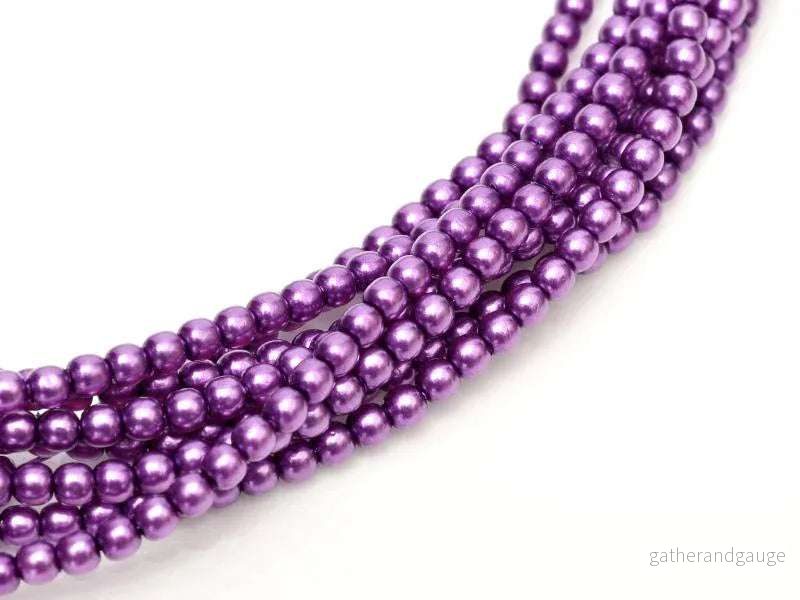 Tjeckiska vaxade glaspärlor - Shiny Deep Magenta 2mm, 1 sträng
