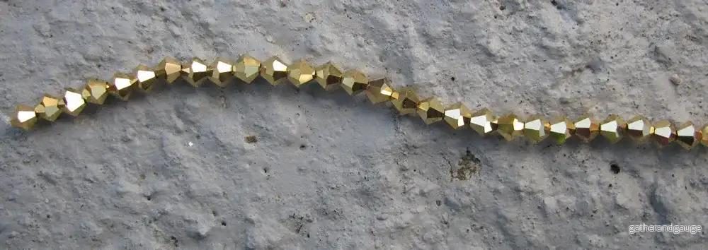 Tjeckiska MC Bicone - Crystal Aurum 4 mm, 30- pack - Bild 3