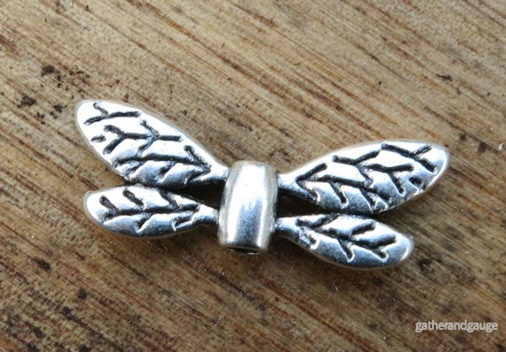Mellandel silverfärgad – sländvingar 22x8mm 1 styck