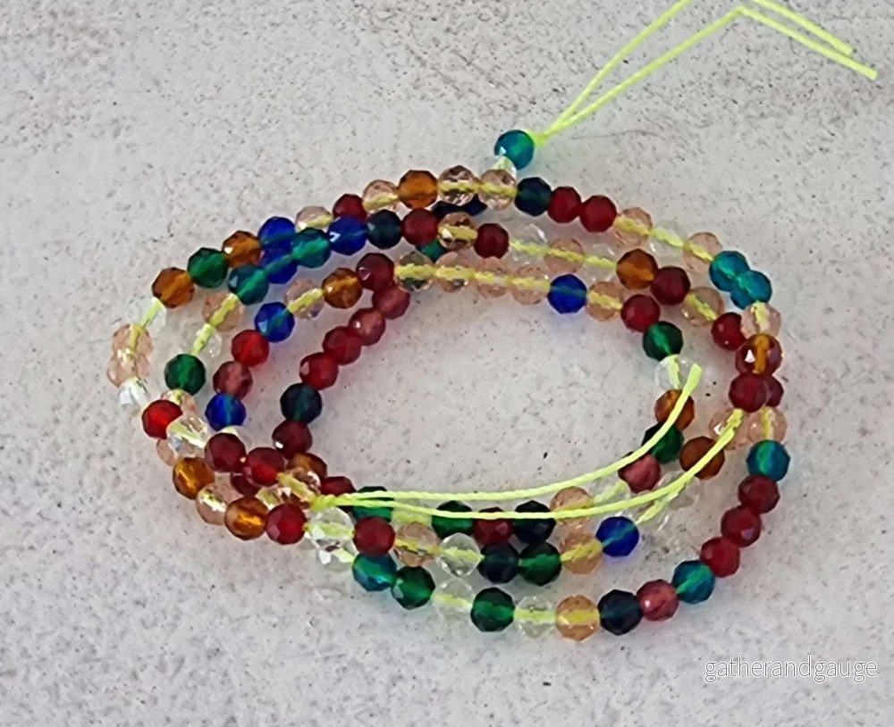 Glaspärlor Facetterade - Runda, Multi 3mm, 1 sträng