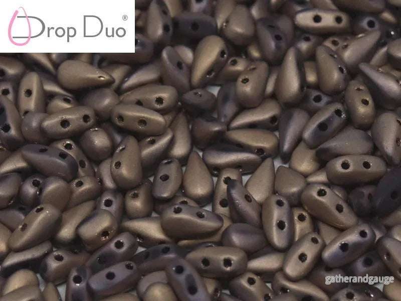 DropDuo® – Jet Full Capri Gold Matted 3x6mm, 30-pack DropDuo® – Jet Full Capri Gold Matted 3x6mm, 30-pack