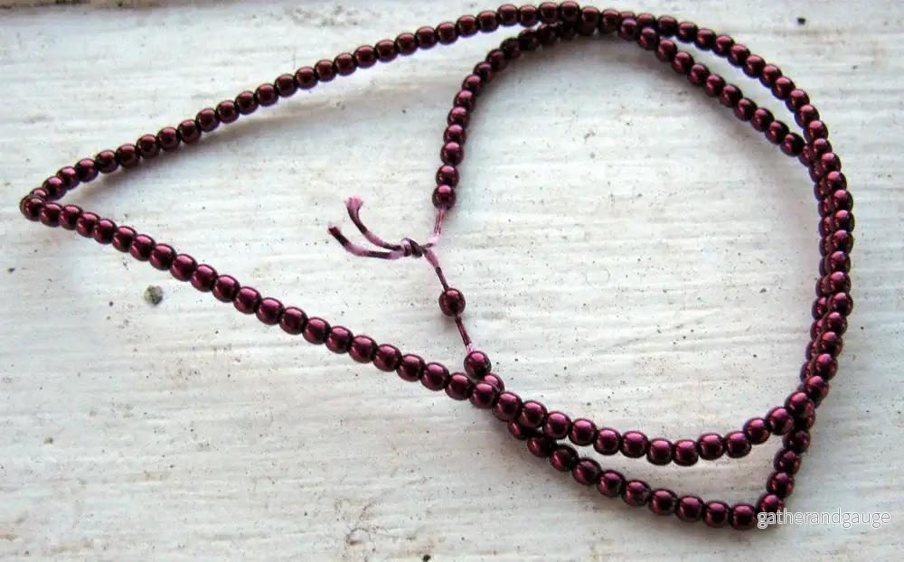 Tjeckiska vaxade glaspärlor - Burgundy 2mm, 1 sträng - Bild 2