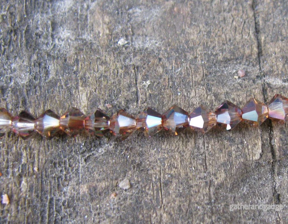 Tjeckiska MC Bicone - Crystal Venus 4 mm, 1 sträng