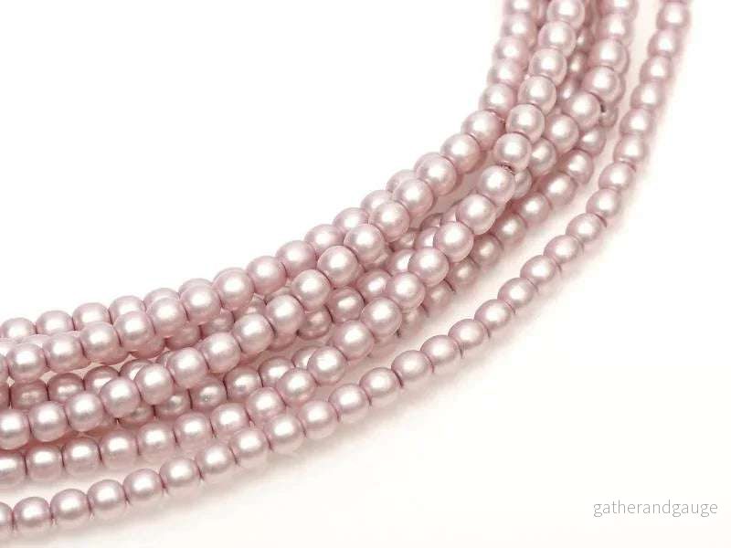 Tjeckiska vaxade glaspärlor - Matted Antique Pink Satin 2mm