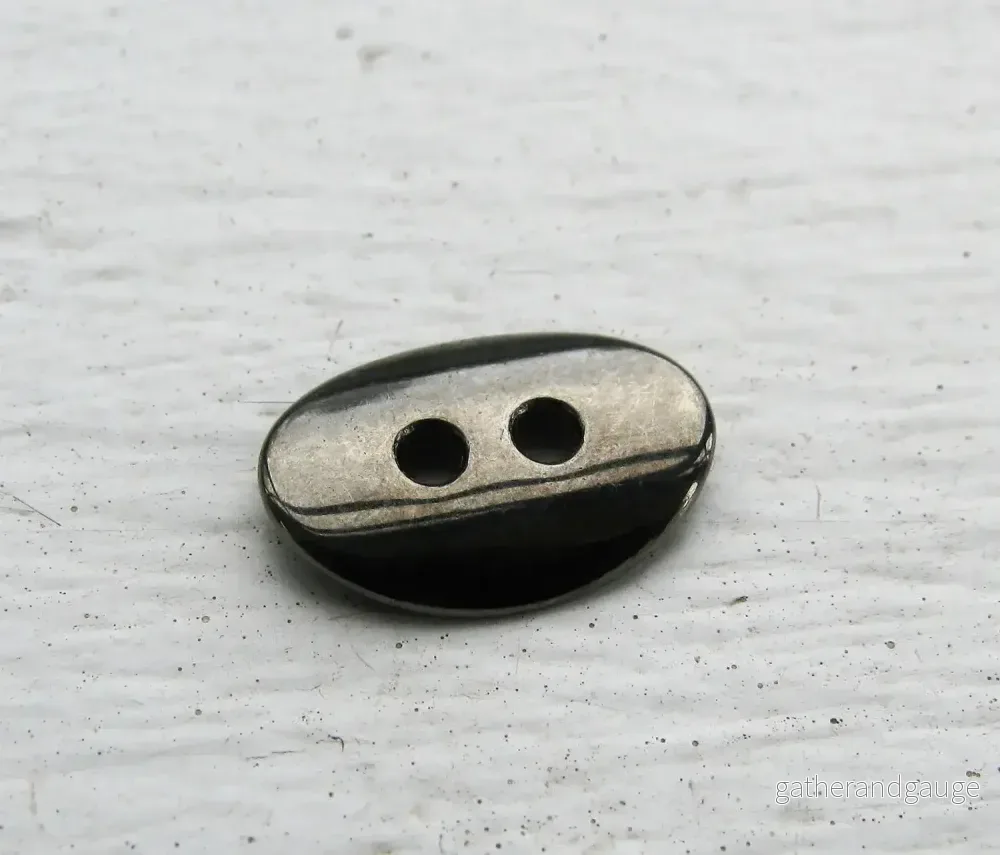 Metallknapp Guntmetallfärgad - Oval 14x10 mm 1 styck - Bild 2