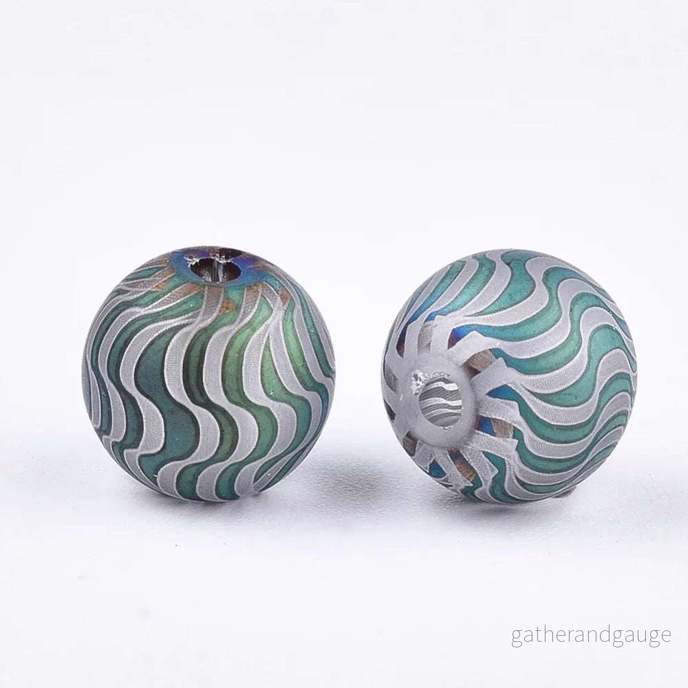 Glaspärla Rund – Randigt mönster Cadet blue 8mm 1 styck Glaspärla Rund – Randigt mönster Cadet blue 8mm 1 styck