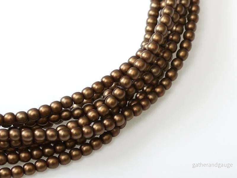 Tjeckiska vaxade glaspärlor - Matted Brown Satin 2mm