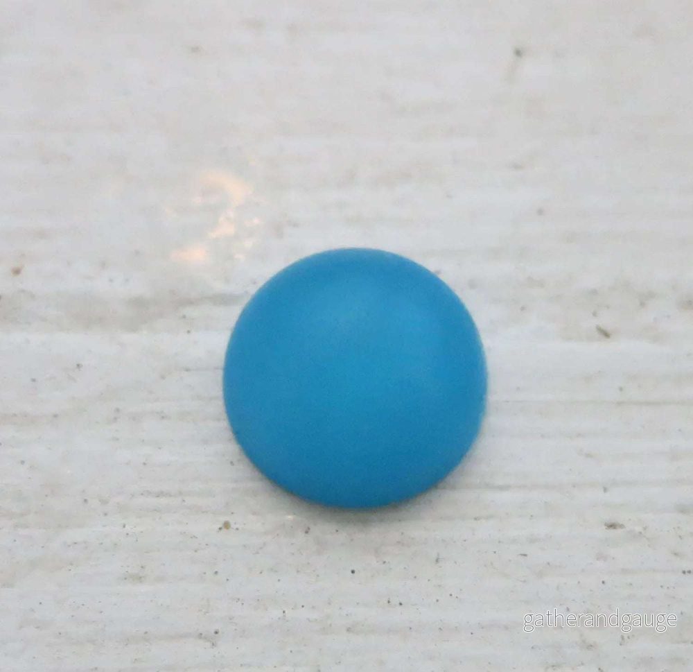 Cabochon av resin – Polaris Turkos, 12mm, 1 styck Cabochon av resin – Polaris Turkos, 12mm, 1 styck