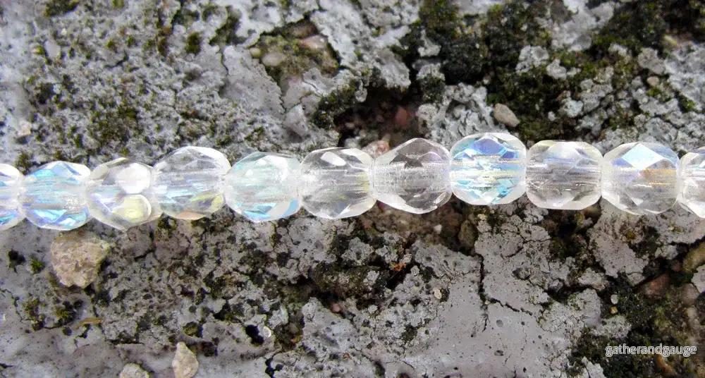 Tjeckiska Firepolish - Crystal AB, 4 mm, 50-pack