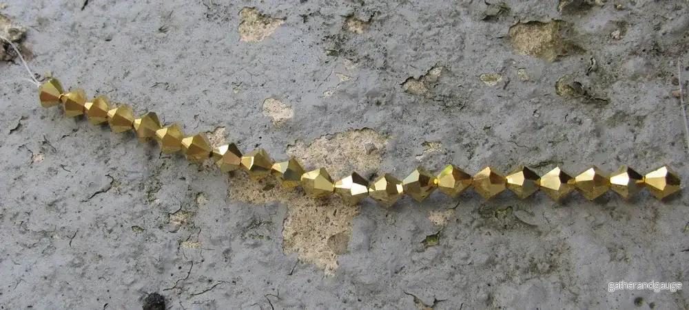 Tjeckiska MC Bicone - Crystal Aurum 6 mm, 18- pack - Bild 3