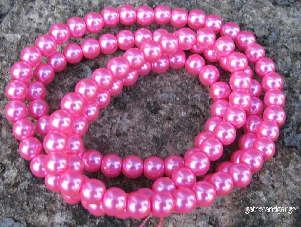 Vaxade glaspärlor - Cerise 8mm 1 sträng