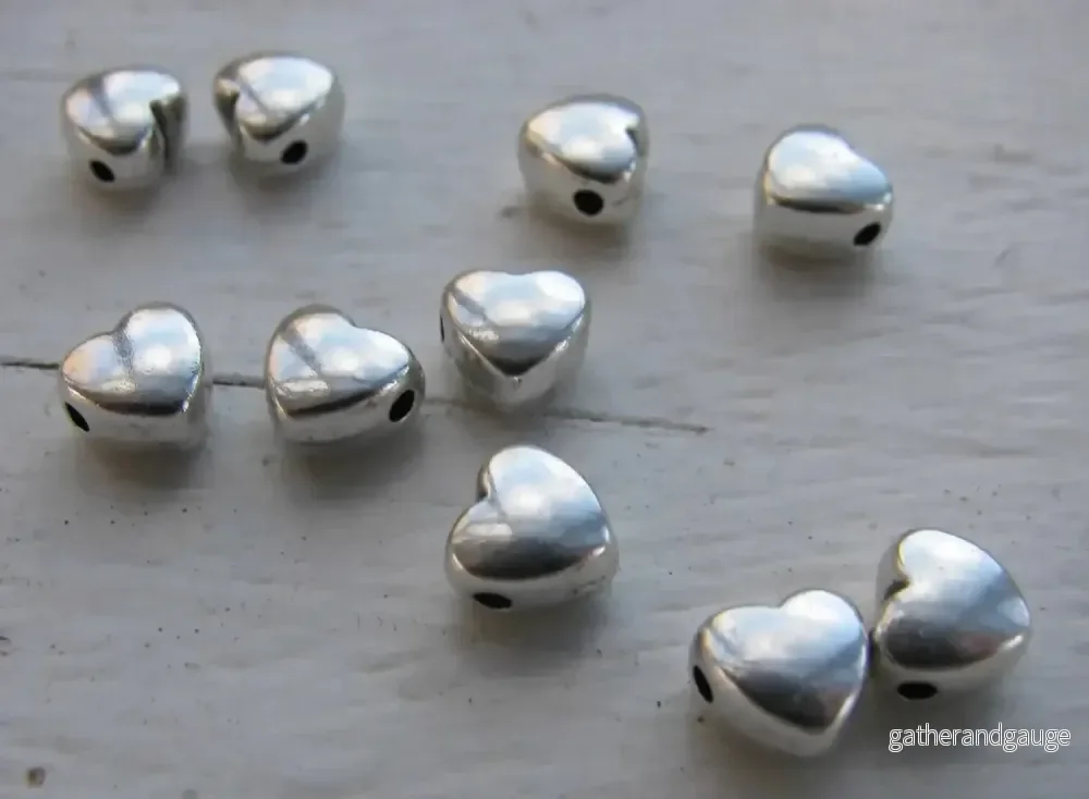 Mellandel Silverpläterad - Mindre bulligt hjärta, 6mm, 10-pack - Bild 2