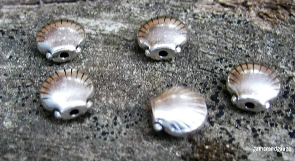 Mellandel silverfärgad – Snäcka 8mm, 5-pack