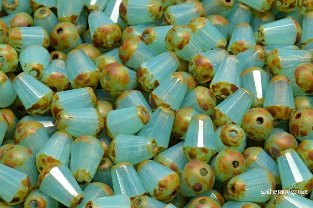 Firepolish Drop Bead – Blue Opal with Travertine 8 x 6 mm, 20-pack Firepolish Drop Bead – Blue Opal with Travertine 8 x 6 mm, 20-pack
