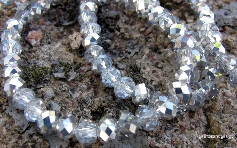 Facetterade glaspärlor - Klar/Silver, 6x4mm 1 sträng - Bild 2