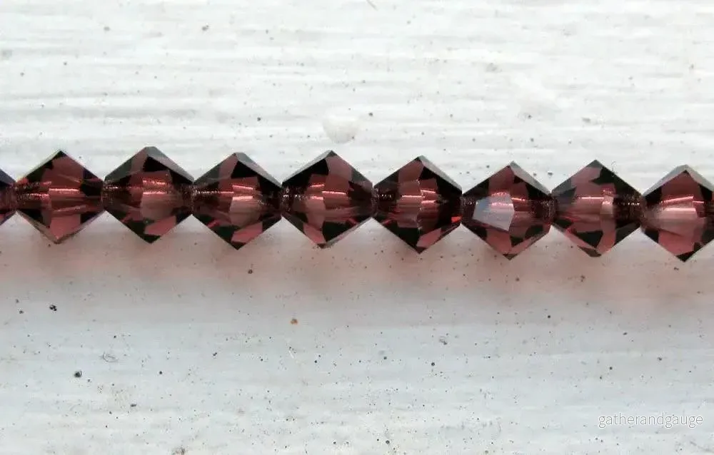 Tjeckiska MC Bicone - Light Burgundy 6 mm, 1 sträng